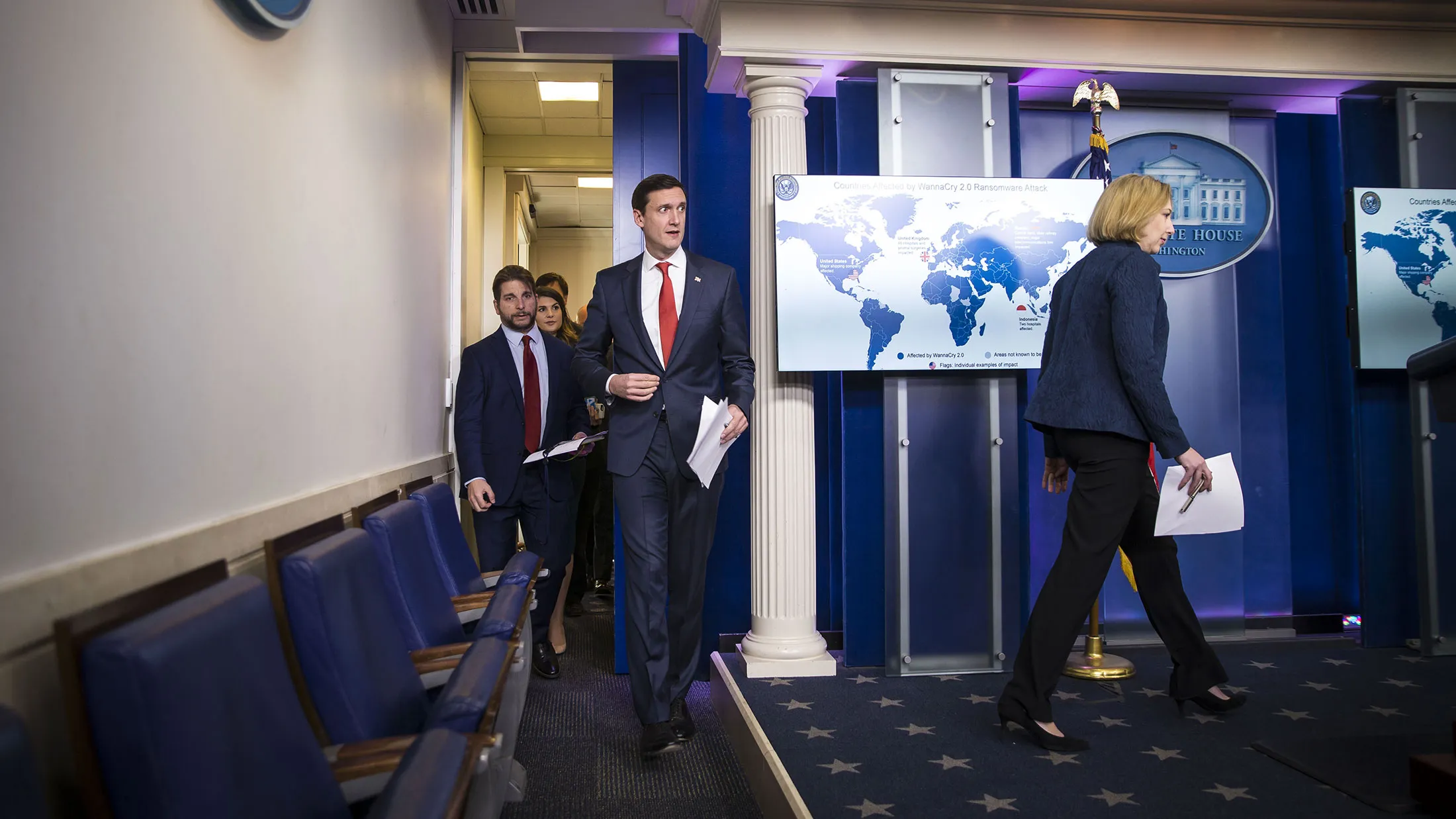 Jeanette Manfra, assistant secretary for cybersecurity and communication at the Department of Homeland Security, right, and Tom Bossert, assistant to President Donald Trump for DHS, center, arrive for a briefing at the White House in Washington on Dec. 19, 2017.&nbsp;
