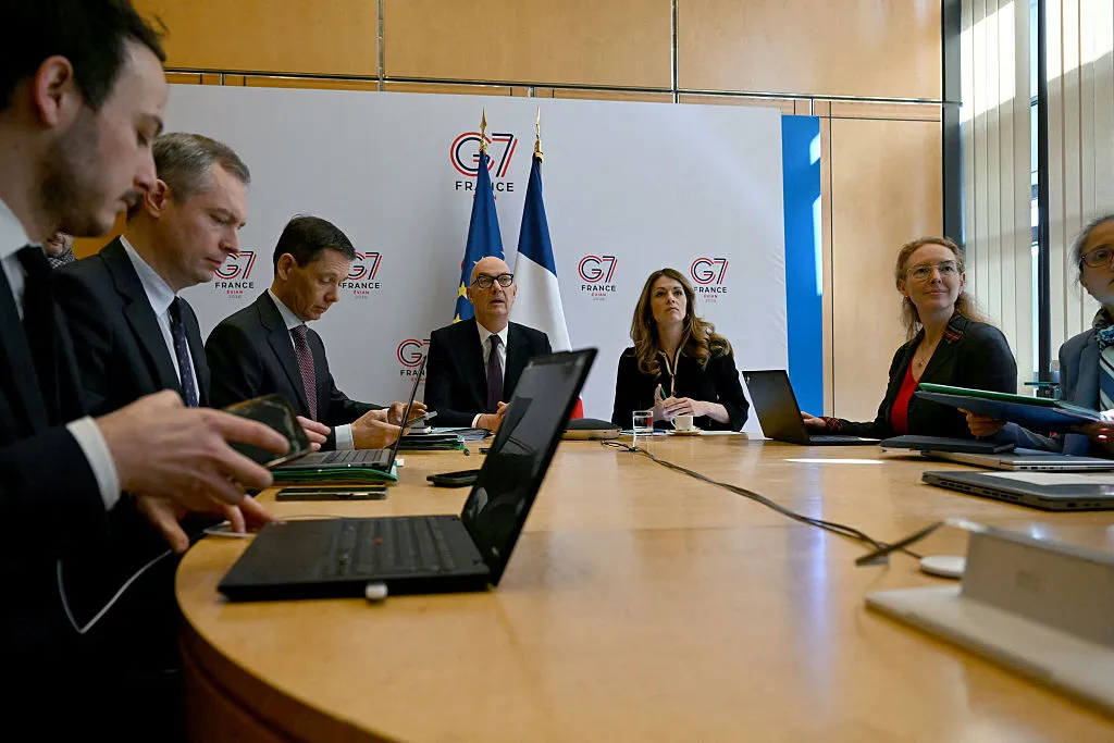 Roland Lescure, center, before hosting a videoconference with the G7 energy and finance ministers with central banks representatives.&nbsp;