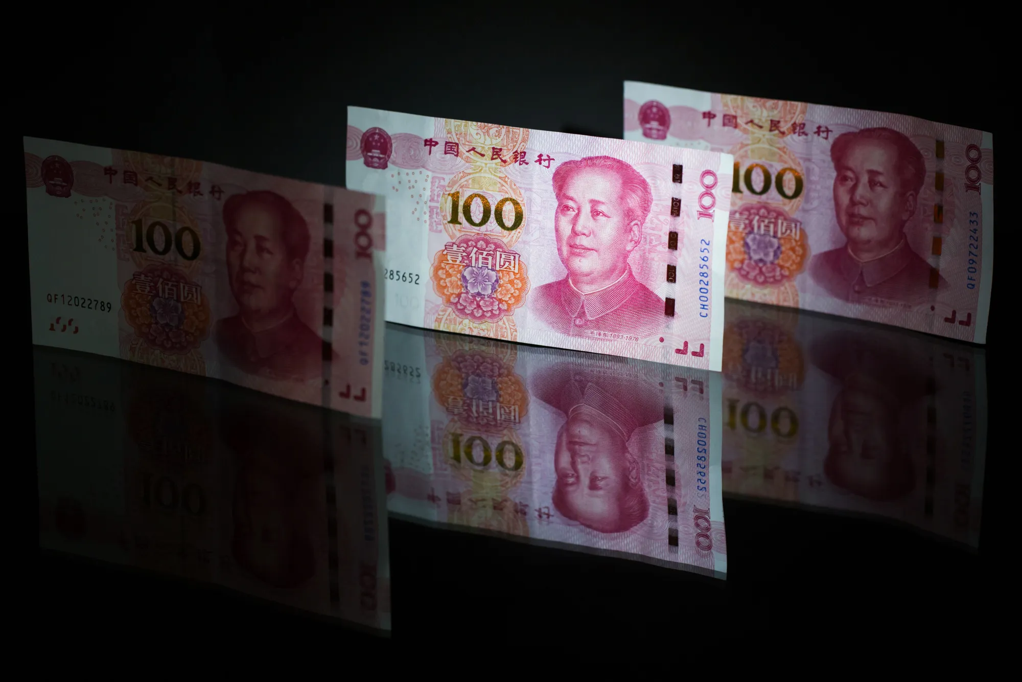 Views Of Chinese Yuan As Yuan Crunch Spurs Banks to Hoard Abroad as China Curbs Outflows