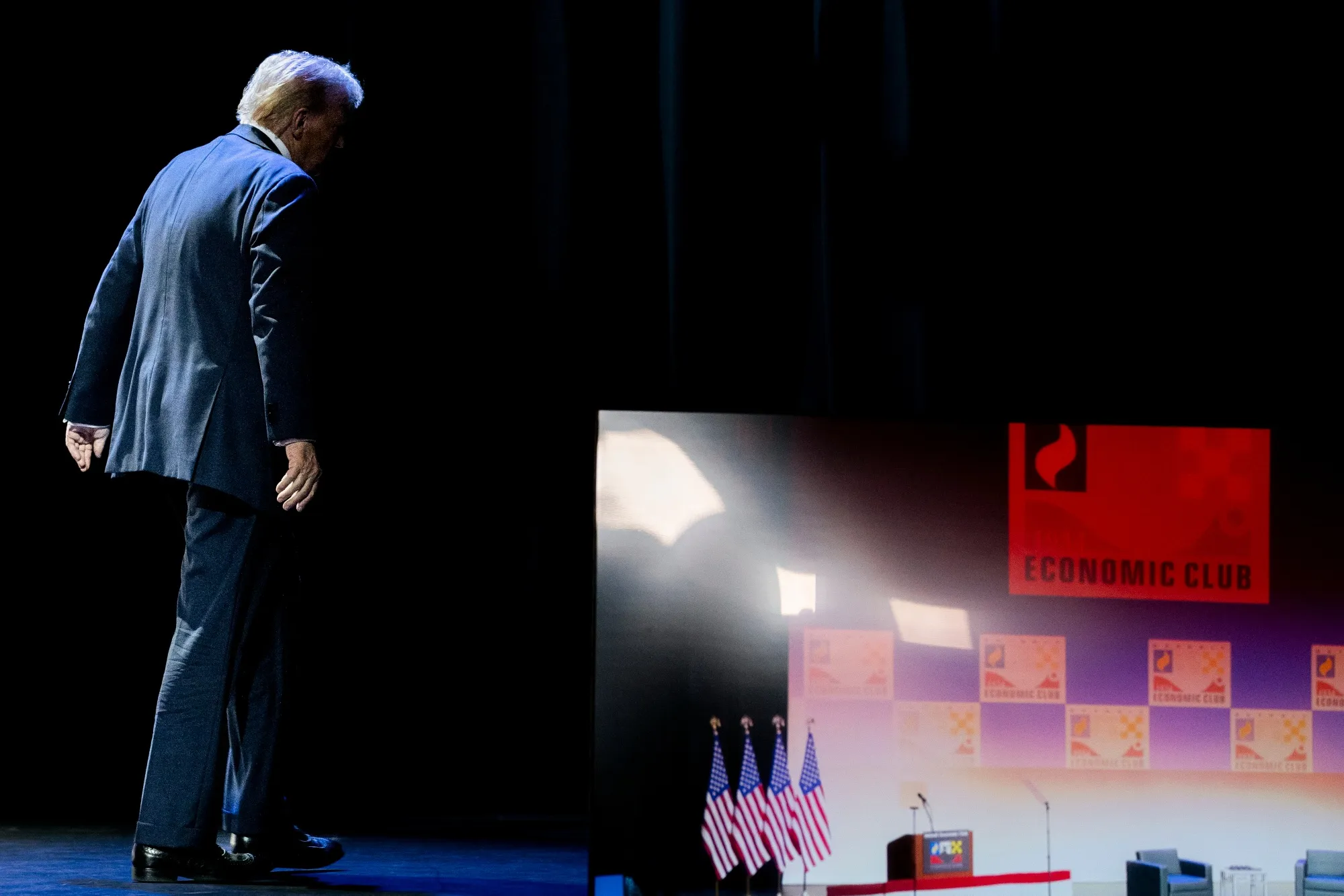 Former President Donald Trump walking off stage after an Oct. 10&nbsp;address to the Detroit Economic Club.