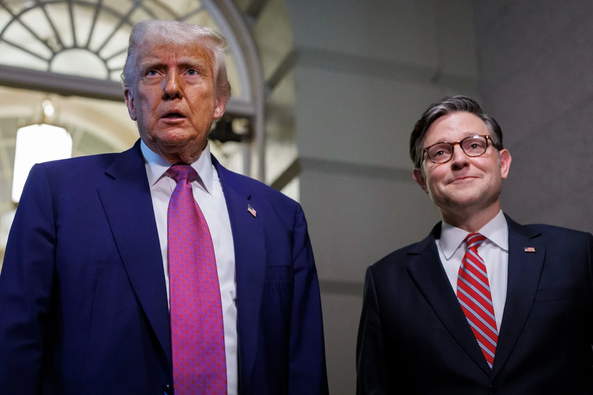 President Donald Trump and US House Speaker Mike Johnson at the US Capitol on May 21.