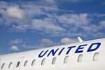 A United Airlines Holdings Inc. airplane sits on a tarmac. 
