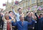 UKIP's Nigel Farage celebrates the Leave victory outside the U.K. parliament.
