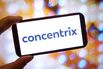 In this photo illustration, a Concentrix company logo is