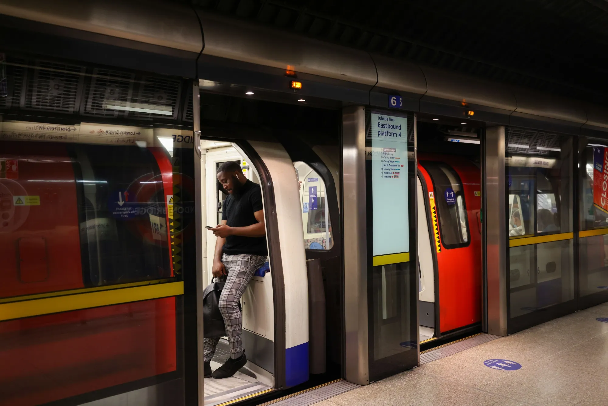 Commuters on a Jubilee Line underground train in London.