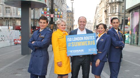 Ryanair's Chief Marketing Officer Kenny Jacobs, center, with cabin crew in London where the new creations were revealed. Source: Ryanair Holdings