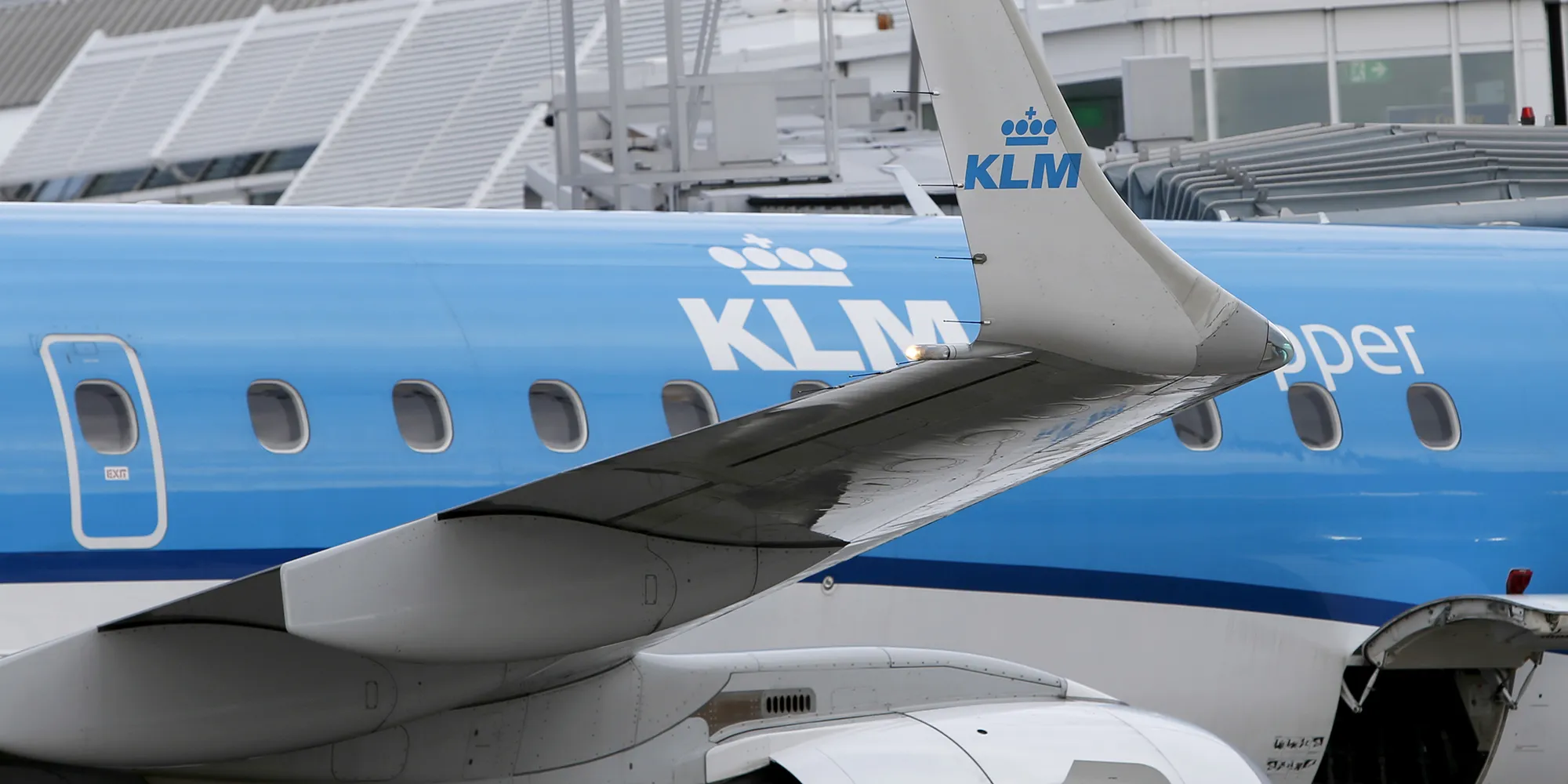 A logo sits on a wing tip of a passenger aircraft operated by KLM, the Dutch arm of Air France-KLM Group, at Munich airport in Munich, Germany.