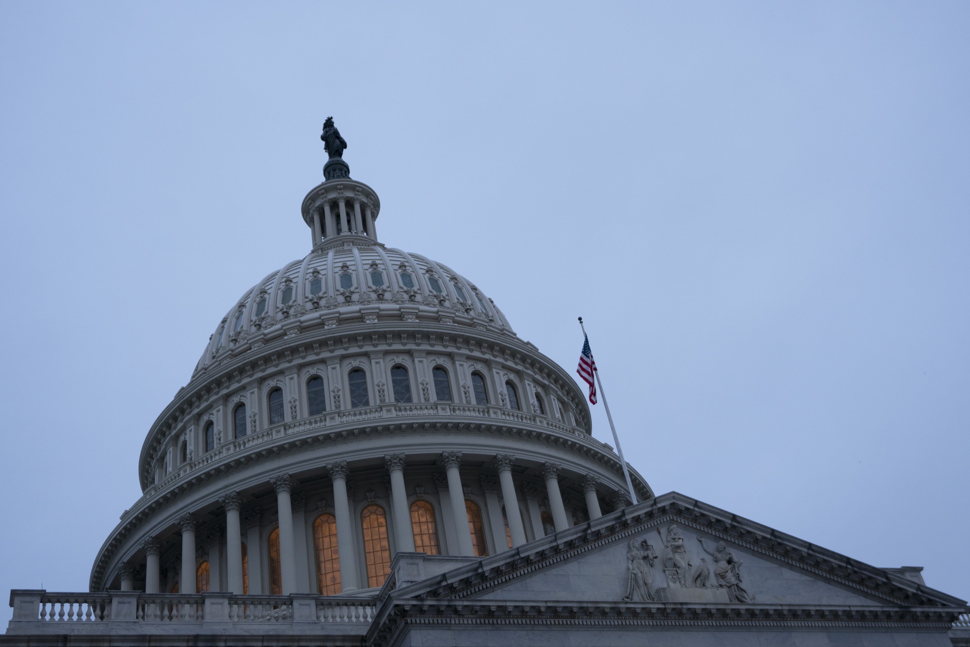 The U.S. Capitol building stands at dawn in Washington, D.C., U.S., on Saturday, Nov. 30, 2019.&nbsp;