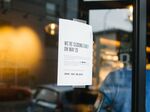 A sign displays early closing hours for diversity training at a Starbucks Corp. coffee shop in Philadelphia on May 29, 2018.