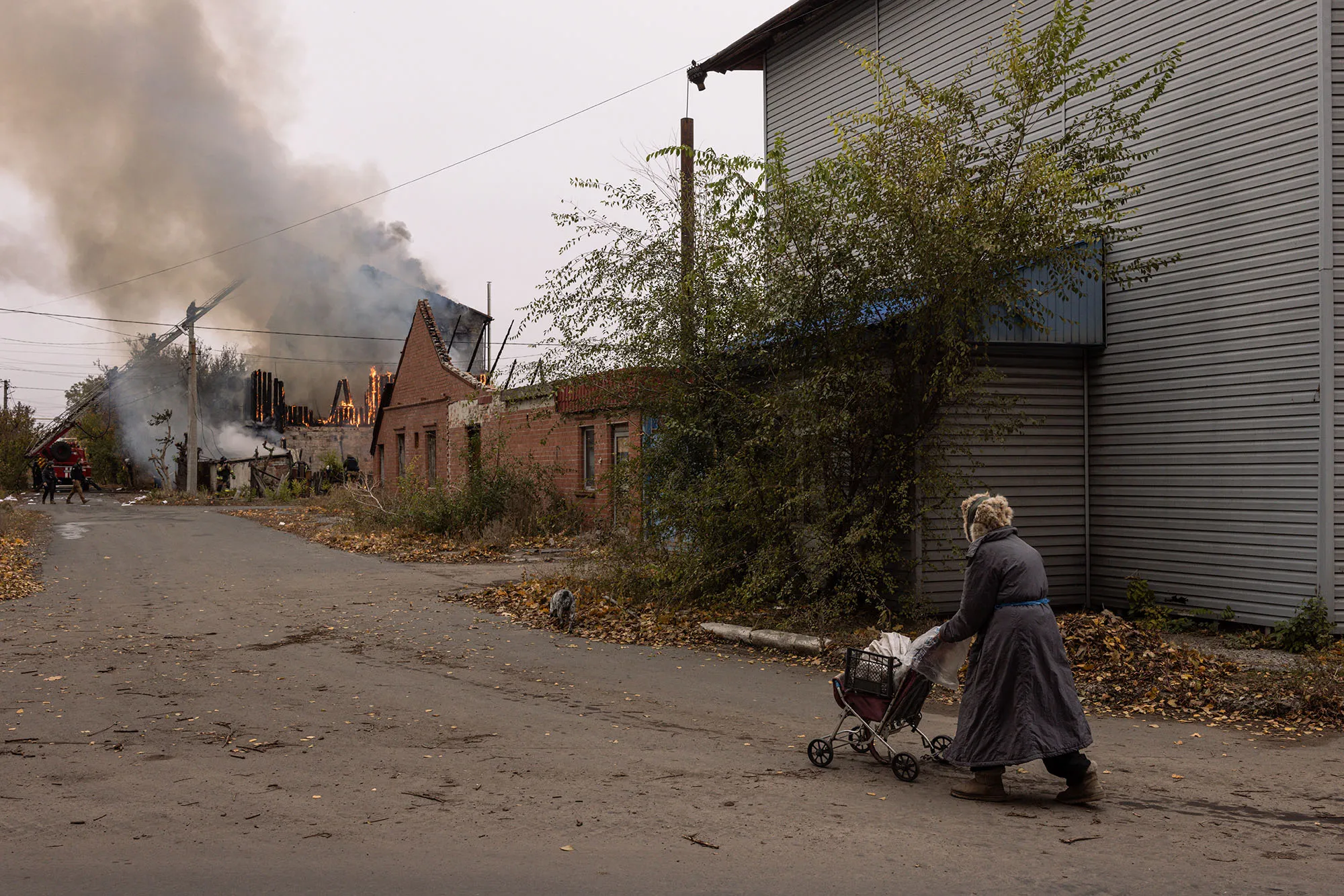 A resident approaches the area of an artillery strike&nbsp;in Pokrovsk, Ukraine, on Nov. 10.&nbsp;