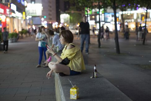 Woman Using Mobile Phone