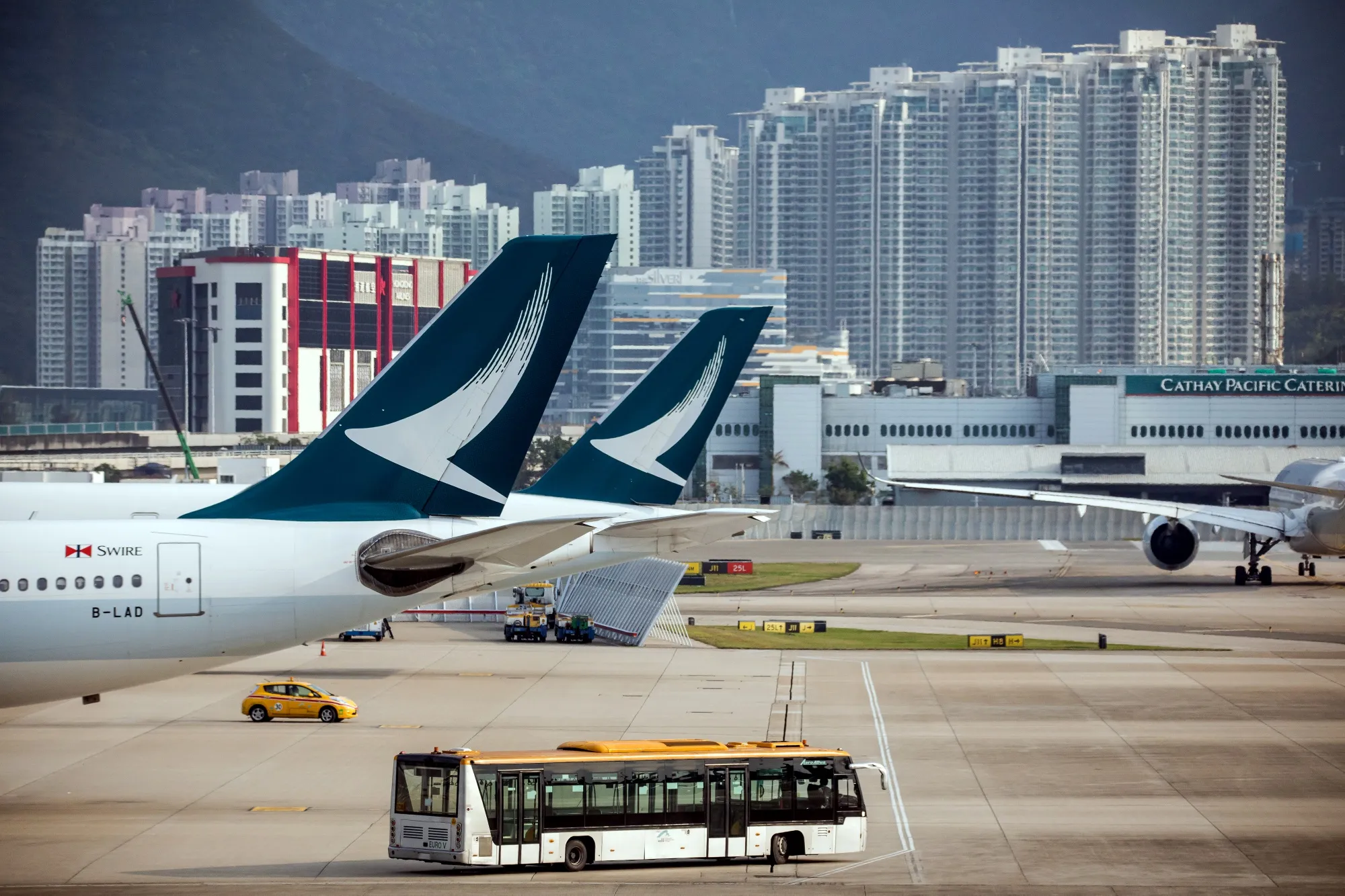 Cathay Pacific Airways Ltd. tail fins are seen at Hong Kong International Airport in Hong Kong, China.&nbsp;