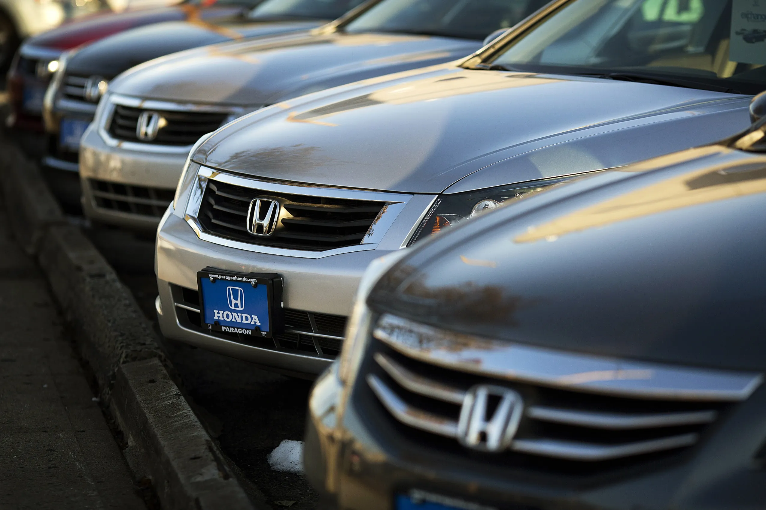 Views of New and Used Honda Vehicles at a Dealership