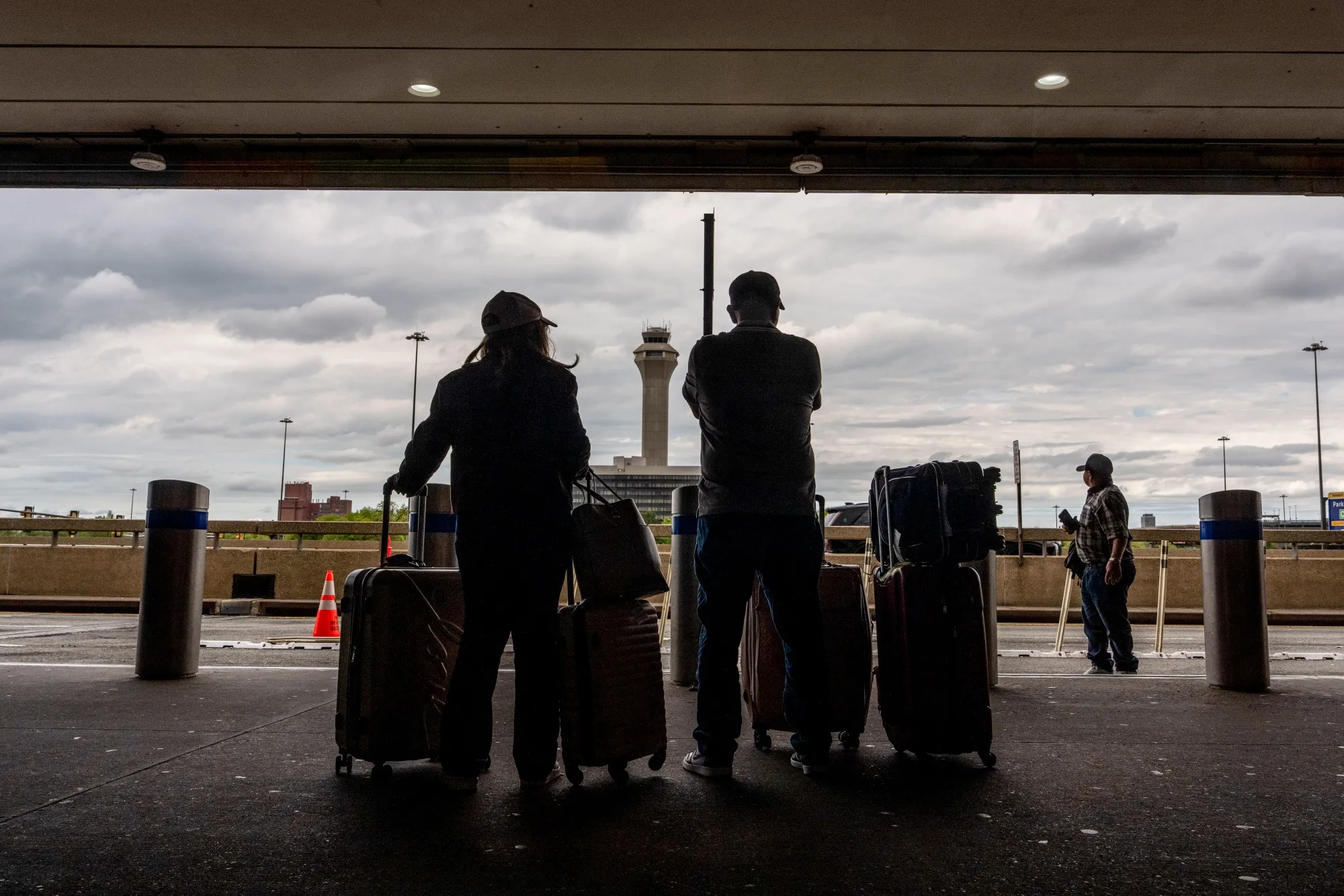 Travelers at Newark Liberty International Airport in Newark, New Jersey.