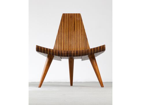 Three-legged chair in five different types of hard wood, with bonded laminated frame and solid, turned joints and legs. Designed by Joaquim Tenreiro, Brazil, c. 1947.