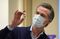 Workers Receive First Doses Of Pfizer Covid-19 Vaccine
