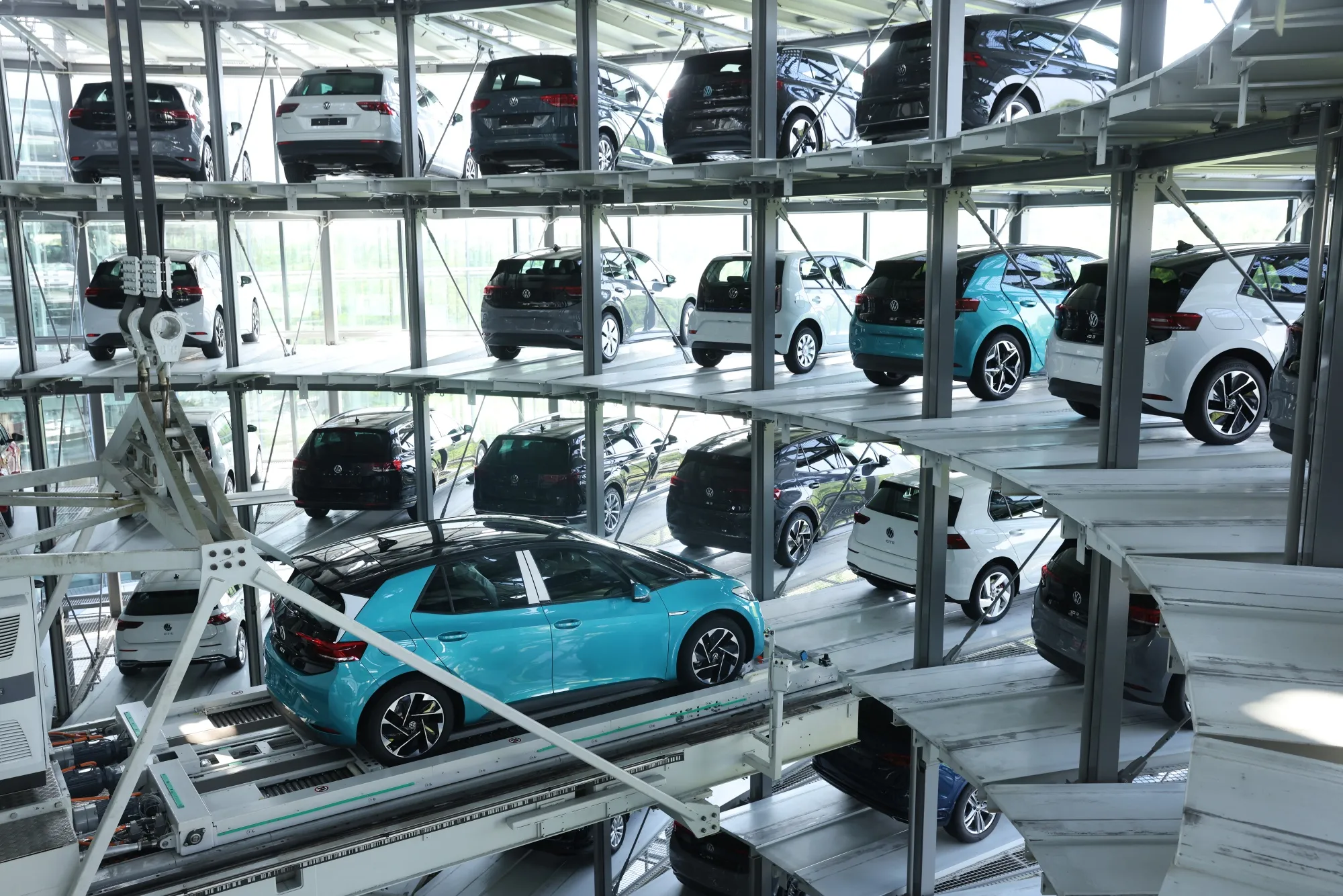 Electric cars in a storage tower at a Volkswagen&nbsp;production facility in Dresden, Germany.