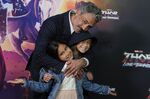New Zealand director Taika Waititi poses for a photo with his daughter's Matewa Kiritapu and Te Hinekahu during a red carpet event for the movie premiere of &quot;Thor: Love and Thunder&quot; at the Entertainment Quarter in Sydney,Australia, Monday, June 27, 2022.(AP Photo/Mark Baker)