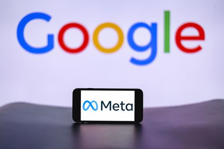 In this photo illustration, the Meta logo is seen displayed