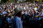 Attendees listen as Pedro Castillo speaks during a campaign rally in Piura, Peru on&nbsp;April 27.