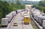 Trucks queue during Operation Brock on the M20 near Ashford in Kent, UK, on July 23.