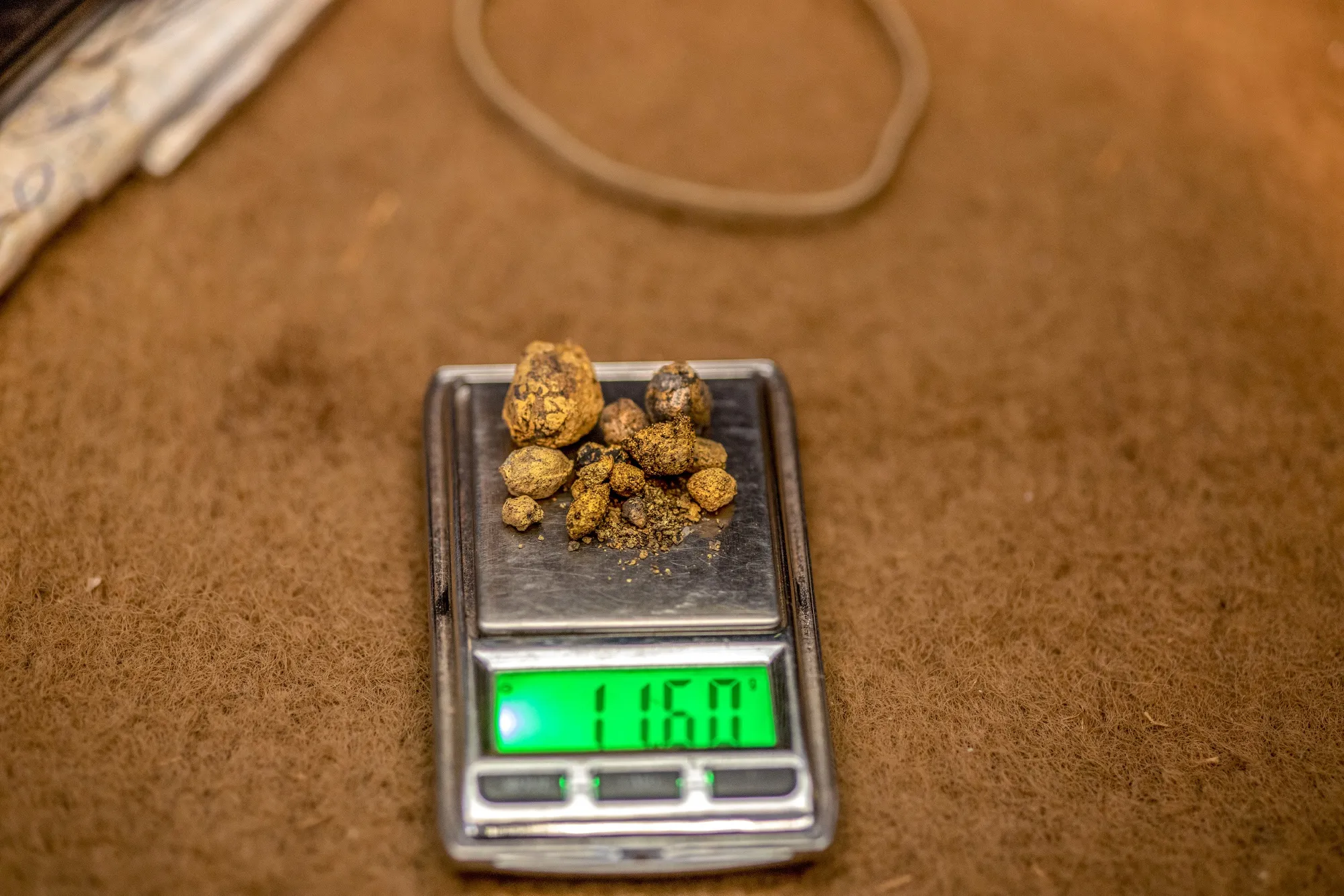 Small balls of gold collected from a mine&nbsp;in Umguza, Zimbabwe.