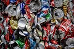 Aluminium cans are seen compressed before recycling in Hong Kong on February 20, 2013. Activists have claimed for years that Hong Kong lags behind the rest of the world on environmental issues ranging from recycling to lanes for cyclists. AFP PHOTO / Philippe Lopez (Photo credit should read PHILIPPE LOPEZ/AFP/Getty Images)
