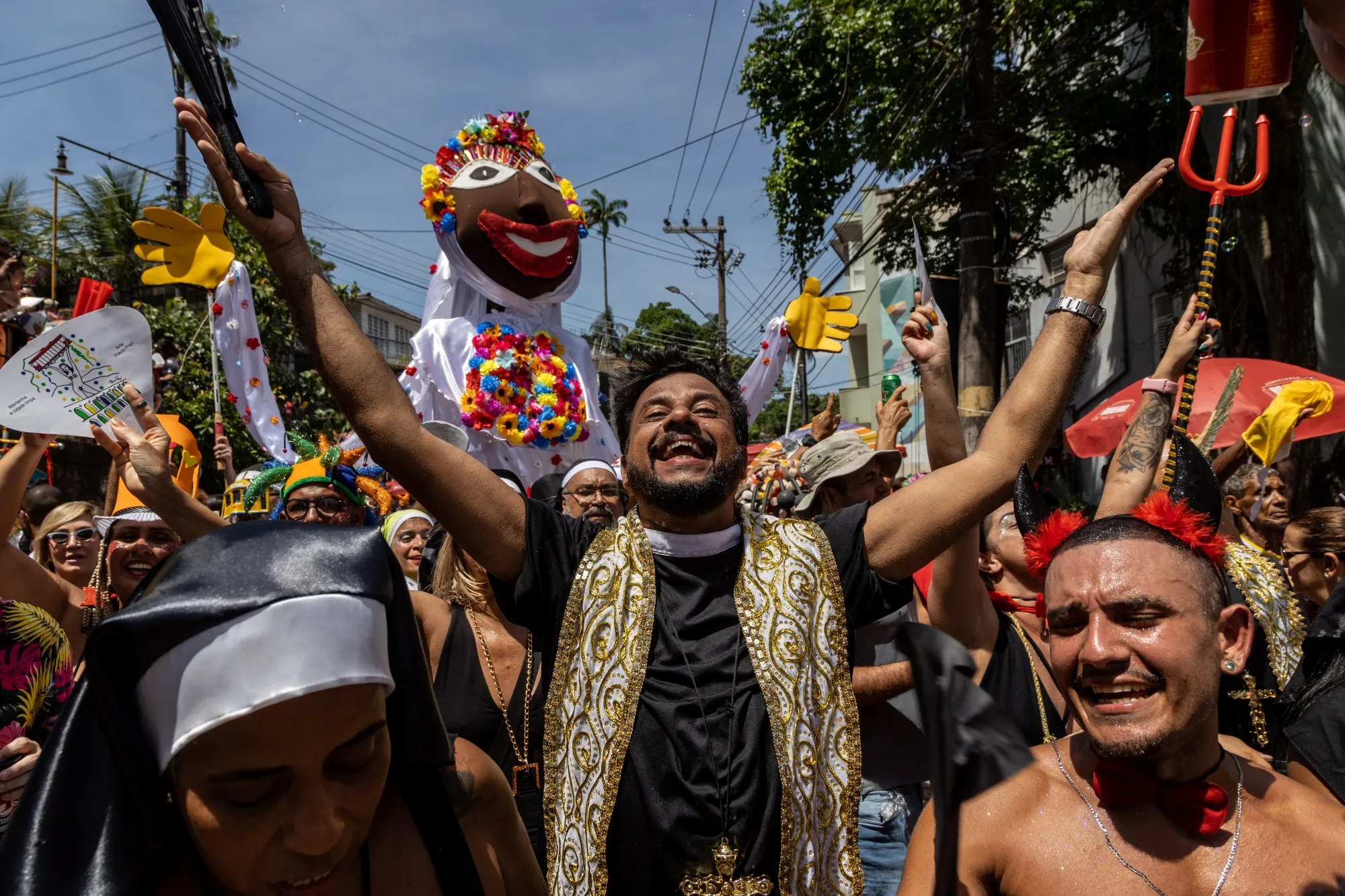 Revelers at a bloco street party during Carnival celebrations in Rio de Janeiro.