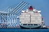 A tugboat guides the Kawasaki Kisen Kaisha Ltd. Bai Chay Bridge cargo ship into the Port of Long Beach in Long Beach, California, U.S., on Wednesday, April 4, 2018. The U.S. trade deficit widened by more than forecast to a fresh nine-year high in February amid broad-based demand for imports, ahead of Trump administration tariffs that have raised the specter of a trade war.