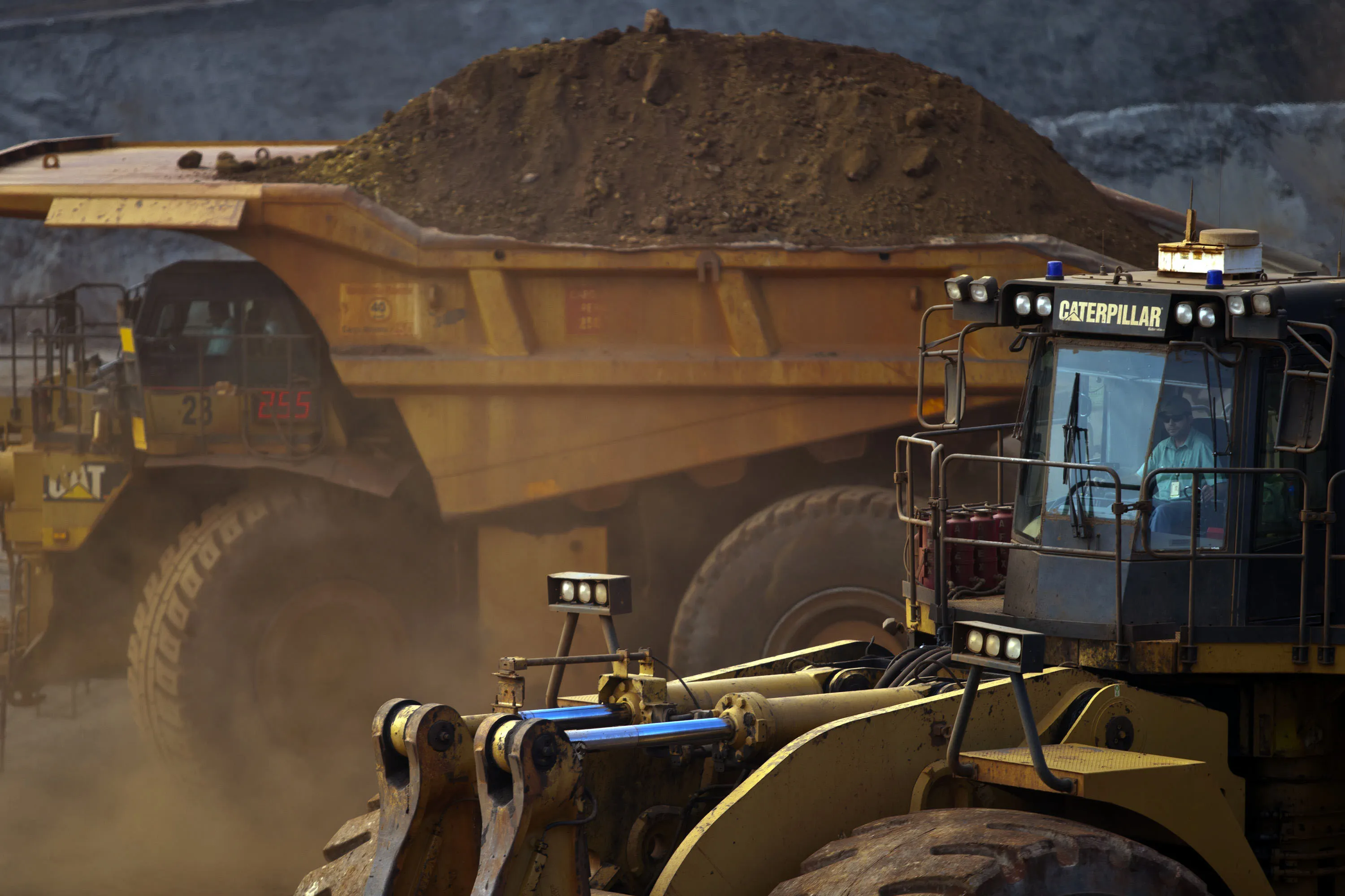 A Caterpillar Inc. dump truck transport mined iron ore at Vale SA's Brucutu mine in Barao de Cocais, Brazil.