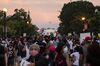 Protestors gather along the recently rename Black Lives Matter Plaza near the White House as the sun sets during continued demonstrations on June 6, 2020 in Washington, United States.