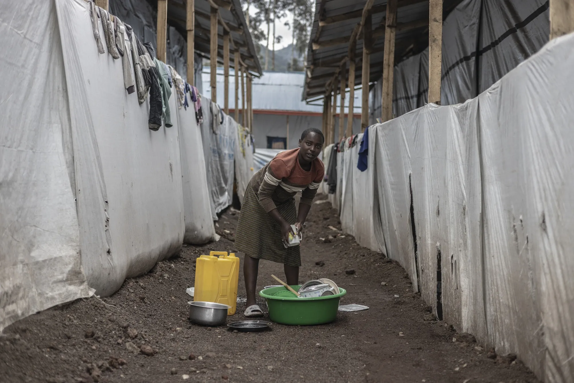 A displaced person from the Democratic Republic of Congo at a transit center in Rubavu, Rwanda on March 26.