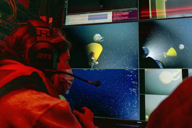 MBARI scientists monitor the MiniROV from the control room.