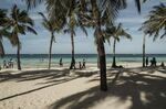 Visitors frolic on a beach in&nbsp;Boracay,&nbsp;the Philippines, in 2022.&nbsp;