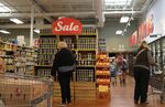 Customers shop at a Lucky’s Market grocery store in Plantation, Florida. 