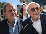 Michel Platini, left, and Sepp Blatter arrive at Federal Criminal Court, in Bellinzona, Switzerland, on July 8.
