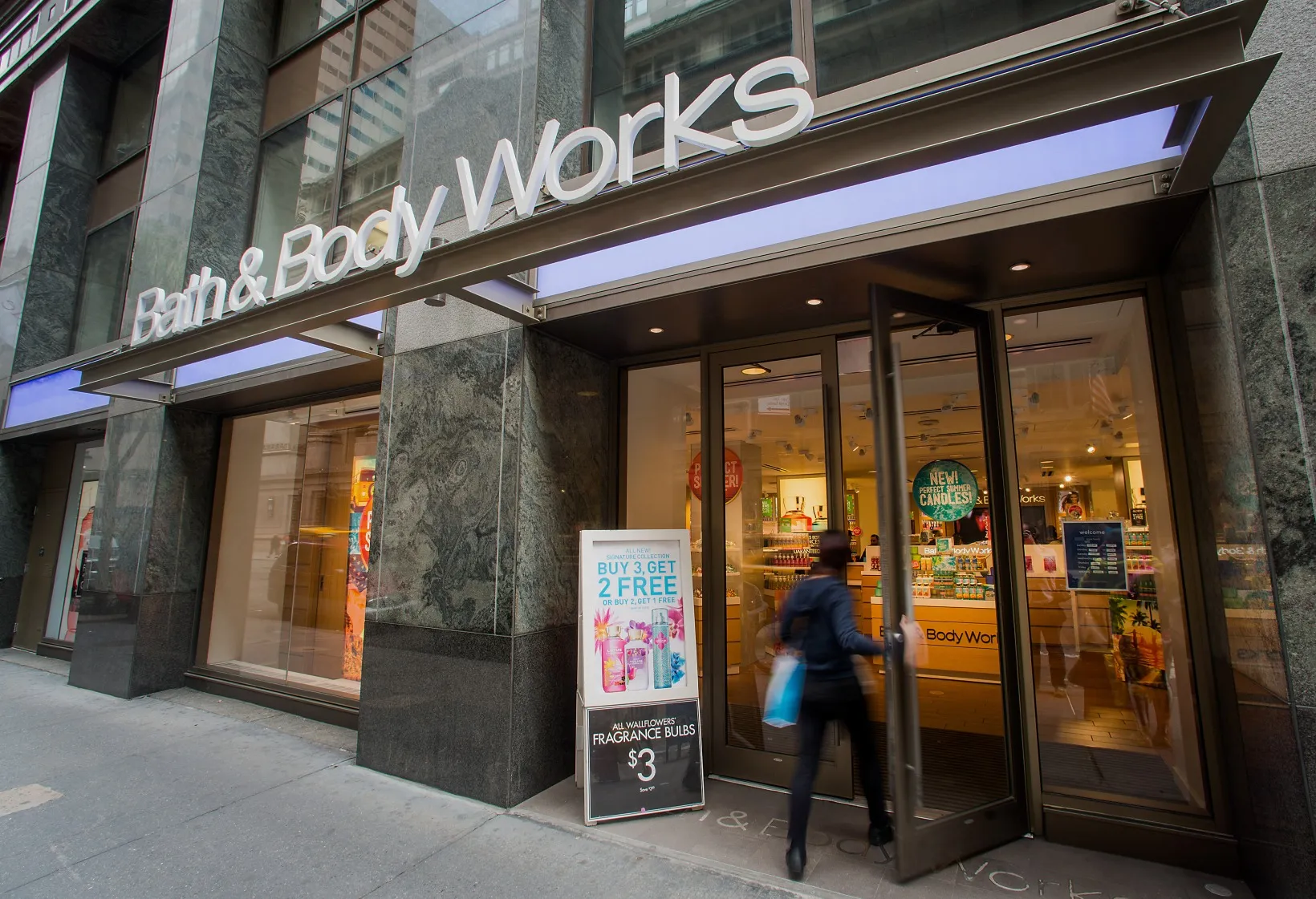 A shopper enters a Bath &amp; Body Works store, a subsidiary of L Brands Inc., in New York.