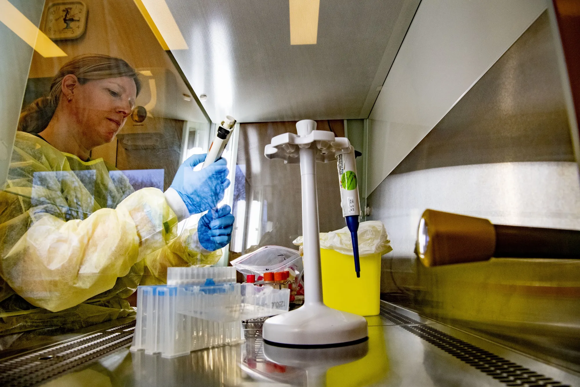 A lab technician performing test for samples taken from COVID-19 coronavirus suspected patients at Amphia Hospital in Brenda.