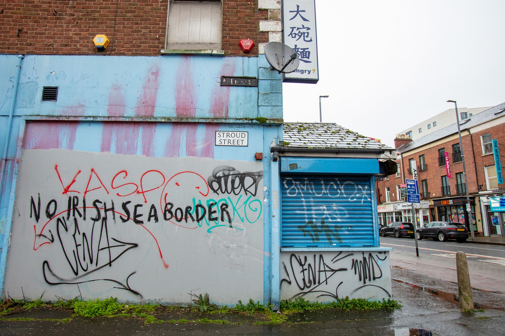 Graffiti on a building reads &quot;No Irish Sea border&quot; in the Sandy Row area in Belfast, on Feb. 4.
