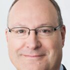 Headshot of Eric D Siegel