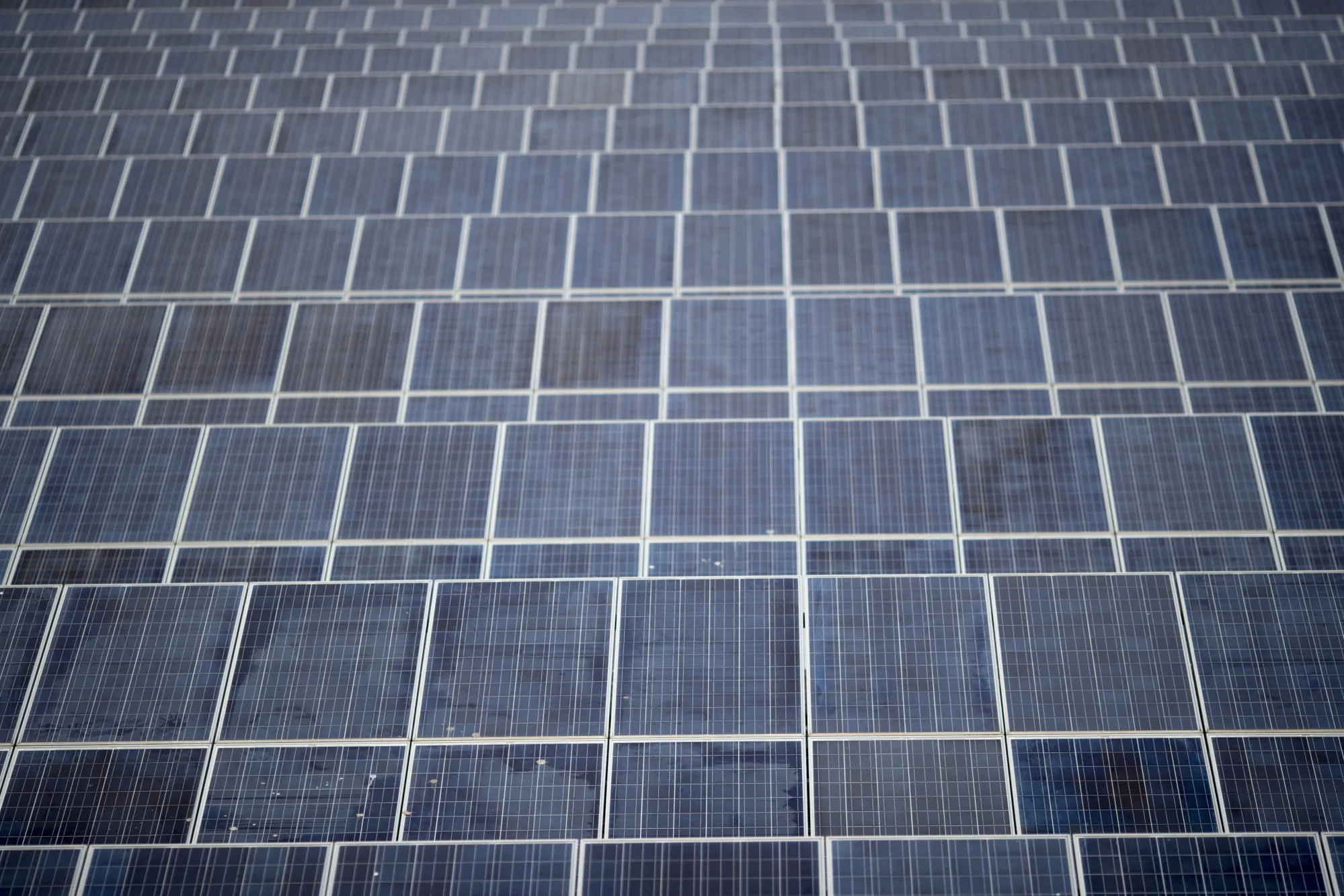 Suntech Power Holdings Co. photovoltaic solar panels stand at the Sri Chula solar farm, operated by Gunkul Engineering Pcl., in Nakhon Nayok, Thailand, on Thursday, Nov. 2, 2017. Gunkul, the most expensive energy stock in Thailand, plans to invest more than 20 billion baht ($599 million) in Japanese solar projects to boost earnings growth.