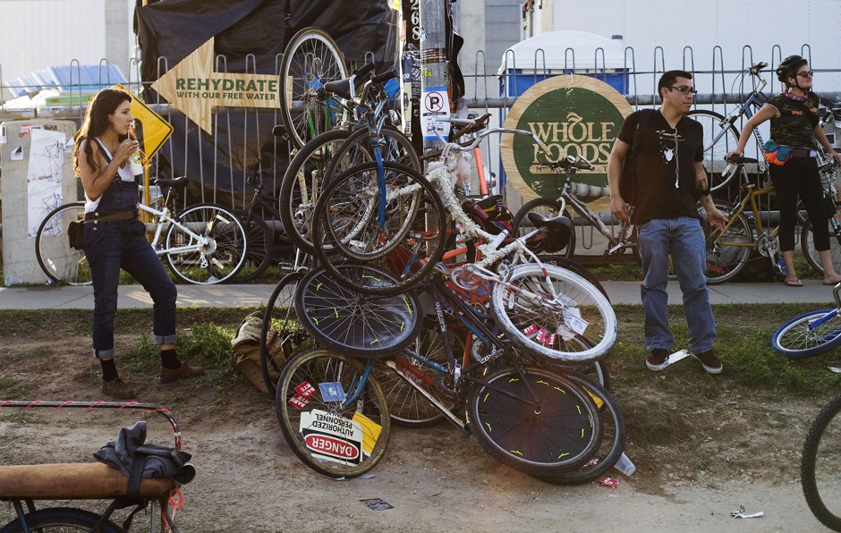 Bikes are piled up during the South by Southwest (SXSW) Music Conference in downtown Austin, Texas in 2012.
