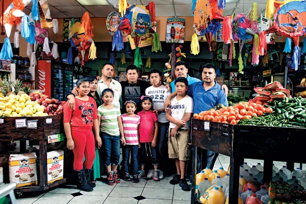 Honorato and family in his Florida grocery