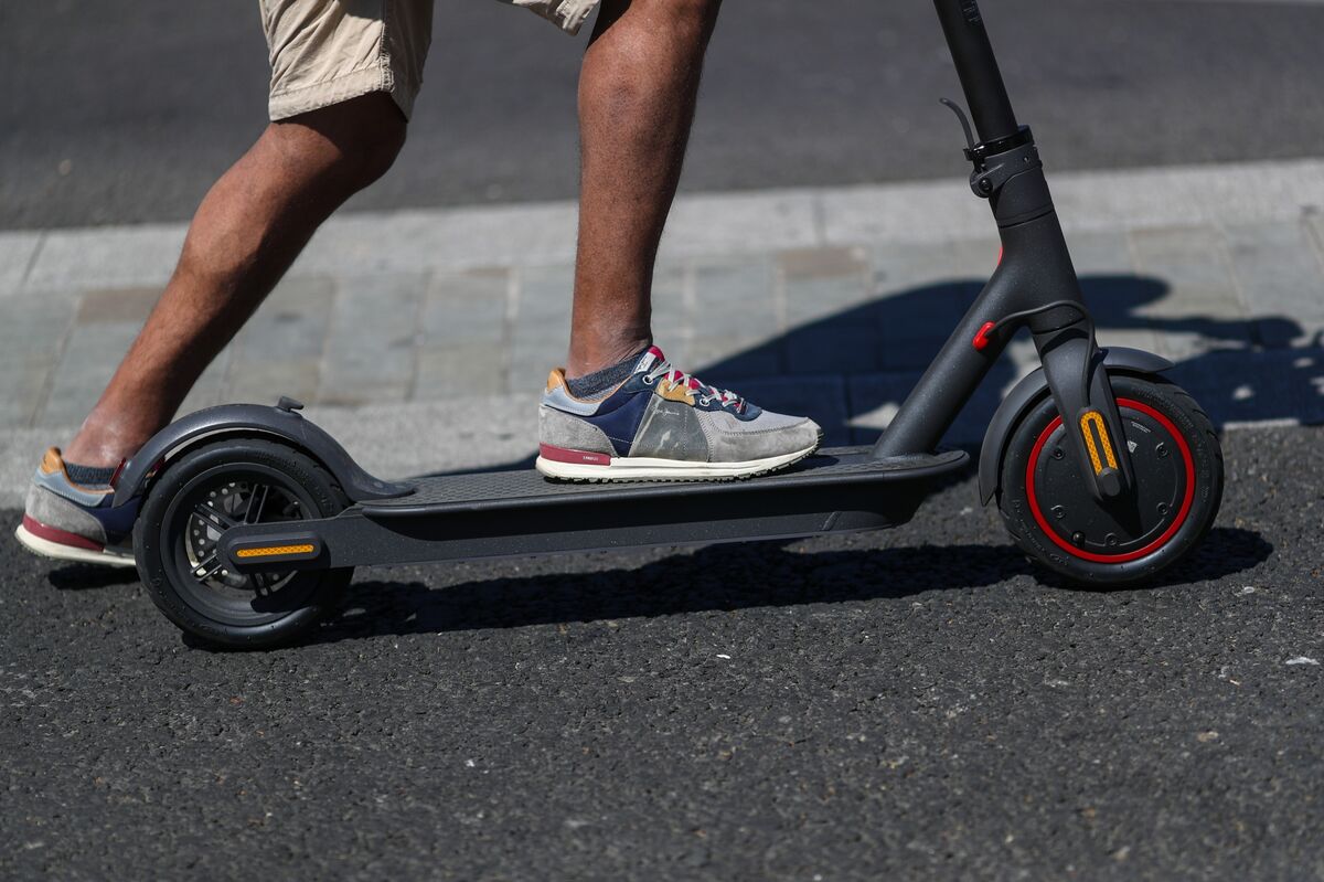 Rental E-Scooters Will Legal on Roads From Weekend - Bloomberg