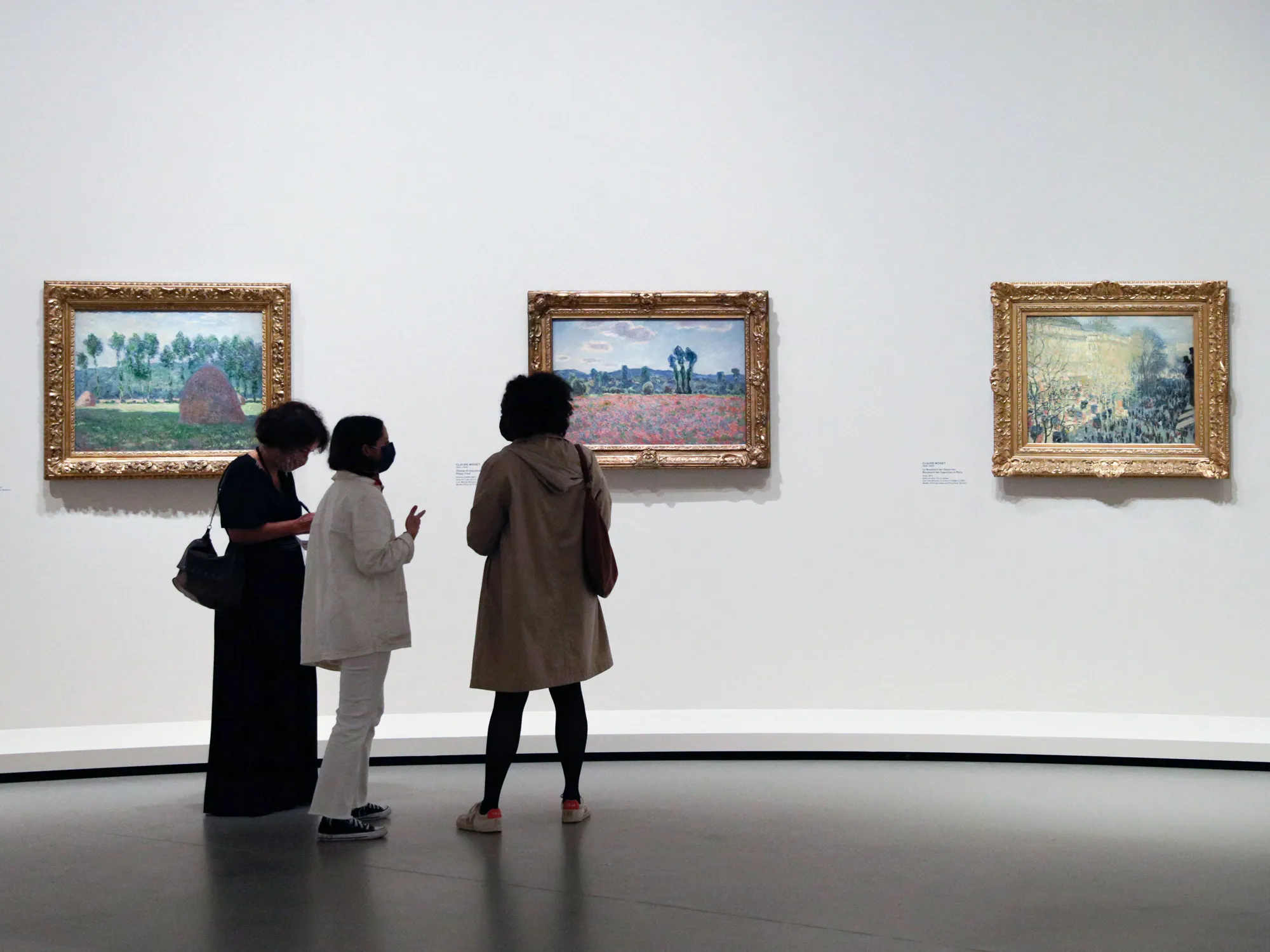 Visitors look at paintings by Pierre Bonnard during the Morozov exhibition, at the Fondation Louis Vuitton in Paris.