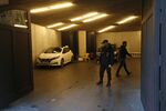 Private security guards secure the parking door entrance to a property owned by Carlos Ghosn, former head of Nissan Motor Co. and Renault SA, in Beirut.