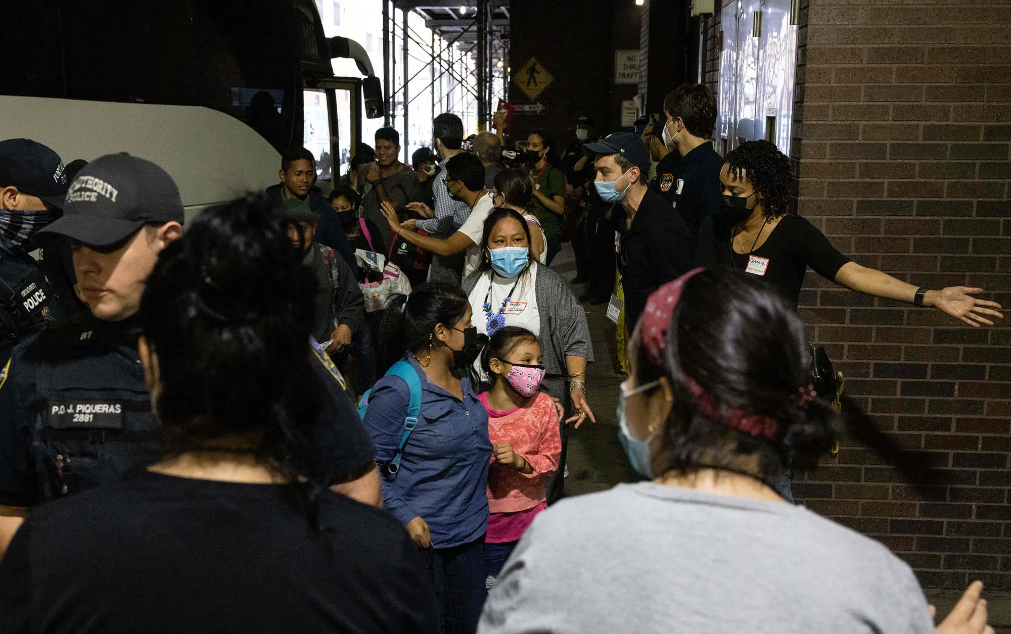 A bus carrying migrants from Texas arrives at Port Authority Bus Terminal in New York on Aug. 10.