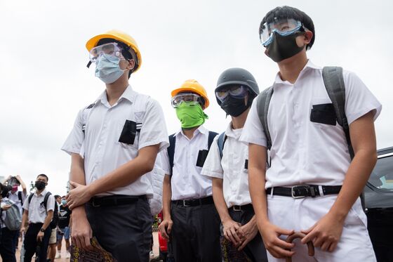 Hong Kong Financial Elites Shun Local Schools as Protests Mount