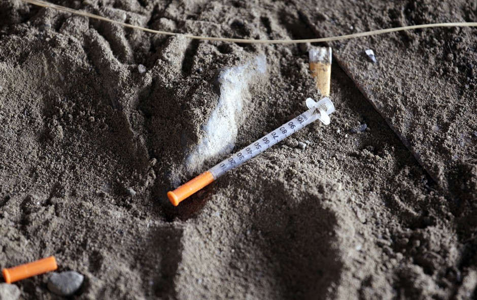 A syringe used to inject OxyContin found on the ground in Everett, Washington, whose mayor is suing Purdue Pharmaceutical 