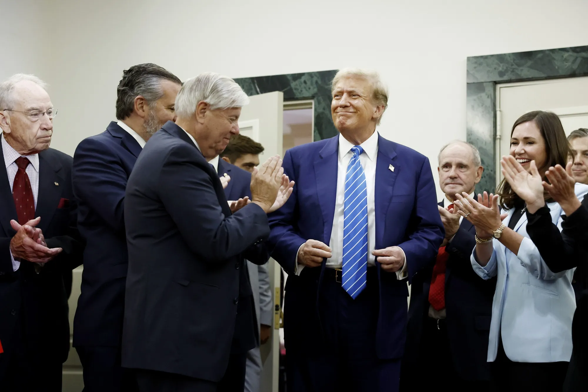Donald Trump speaks with&nbsp;Senate Republicans at the National Republican Senatorial Committee building in Washington, DC, on June 13.&nbsp;